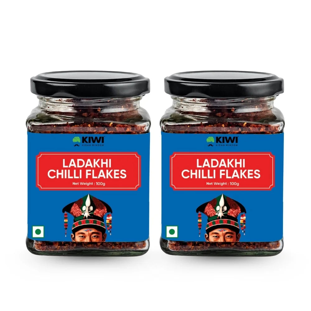 Authentic Ladakhi Chili Mix in a rustic bowl, showcasing vibrant red chili flakes and whole dried chilies.