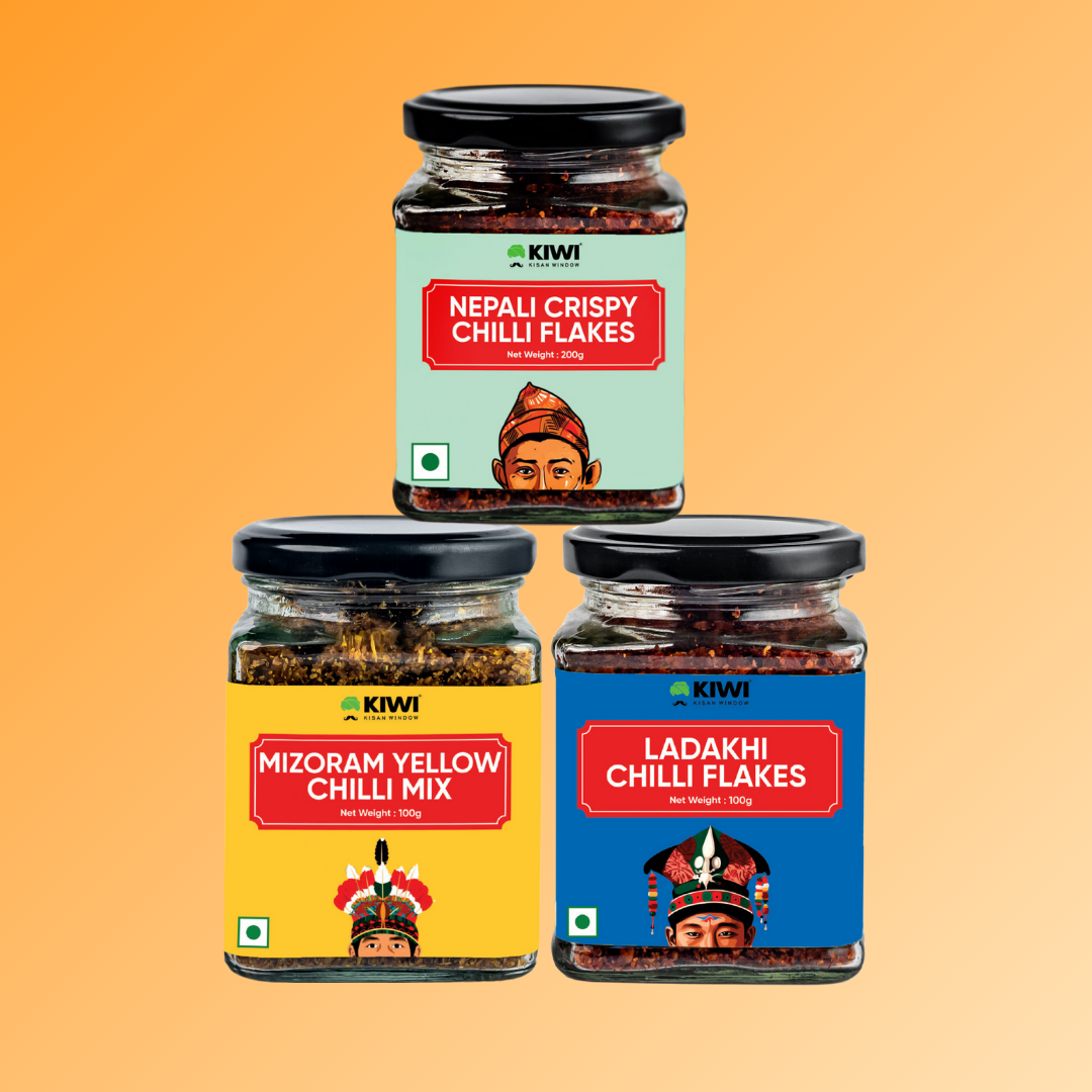 Northeast Chilli Trio: Three glass jars of chili pastes in red, orange, and green hues, showcasing vibrant flavors.