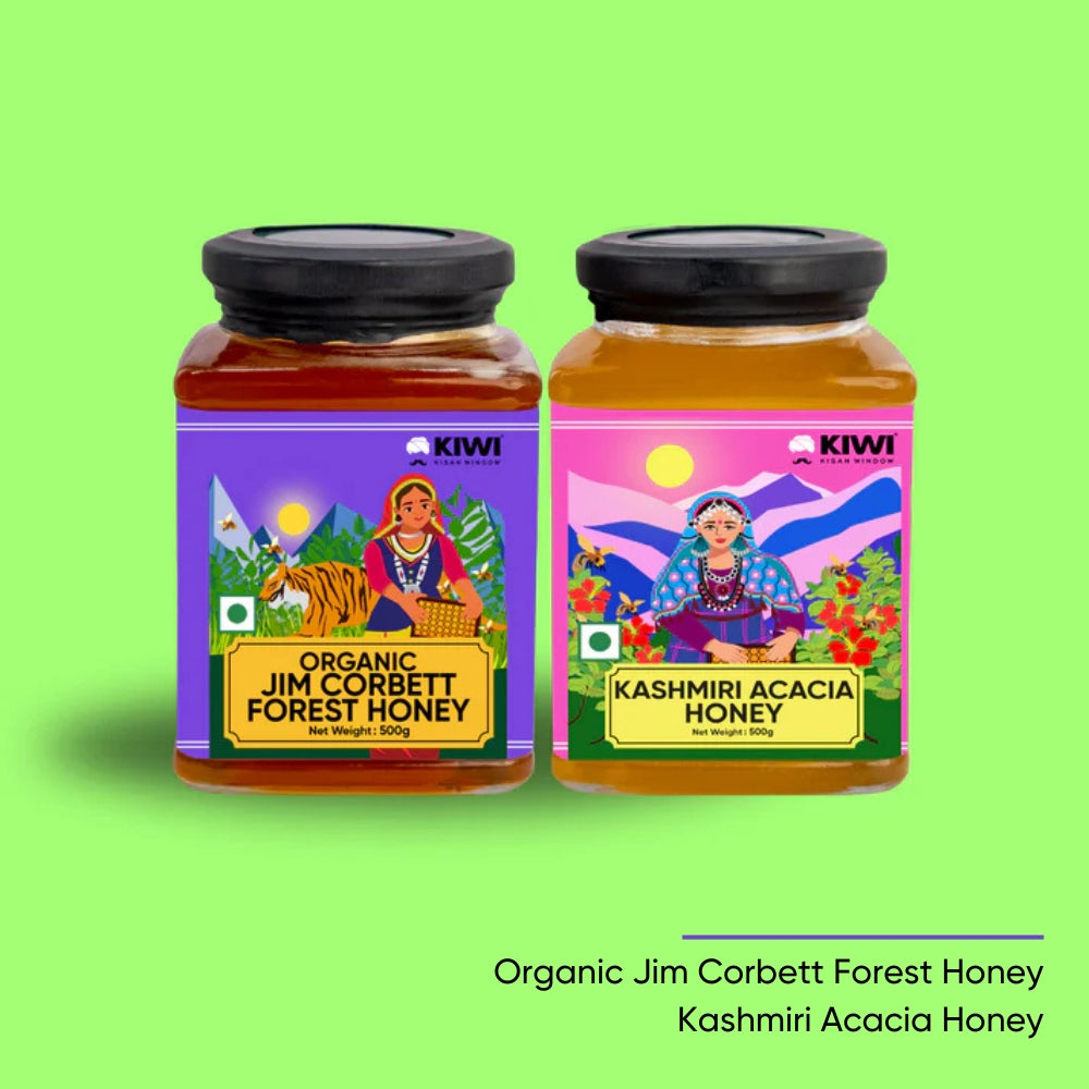 Himalayan Honey Combo: two jars of golden honey with wooden dippers, perfect for sweetening tea.
