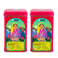 Buraansh Masala Seasoning in a clear glass jar with a black lid, showcasing the vibrant red spice blend.