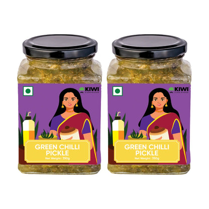 Glass jar filled with vibrant Green Chilli Pickle, showcasing whole and chopped green chillies in oil.